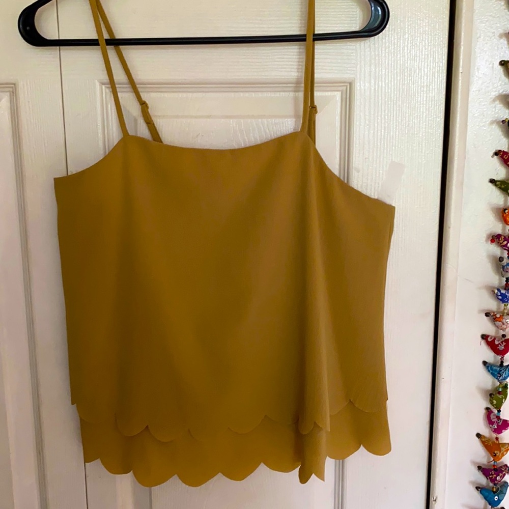 Alythea, mustard color with scallop cut outs. 😍